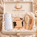 Baby's First Halloween Box with blank wooden keepsake sign, swaddle, and brush and comb